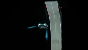 Fotograma de la demostración de Tesla del 15 de octubre de 2026: Roadster en el aire junto a una rampa.